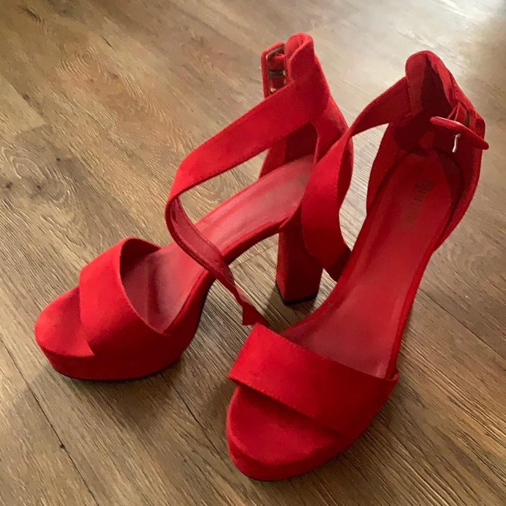 Red suede platform shoes